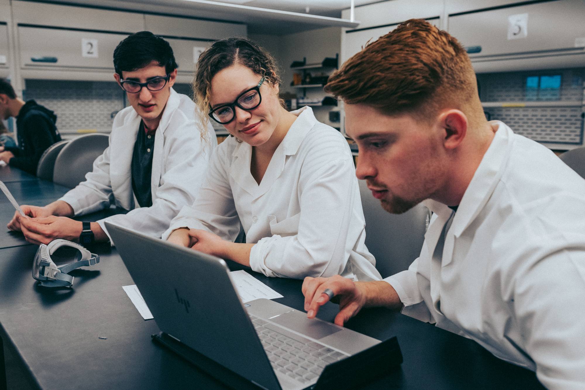 photo of students in lab coats